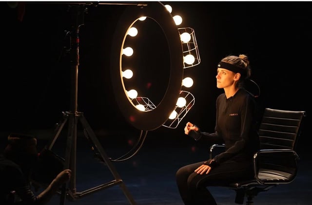 Lady in Xsens suit with lighting on the Love Me set (BTS)