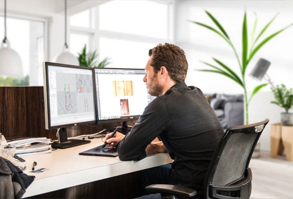 Image of man working at computer