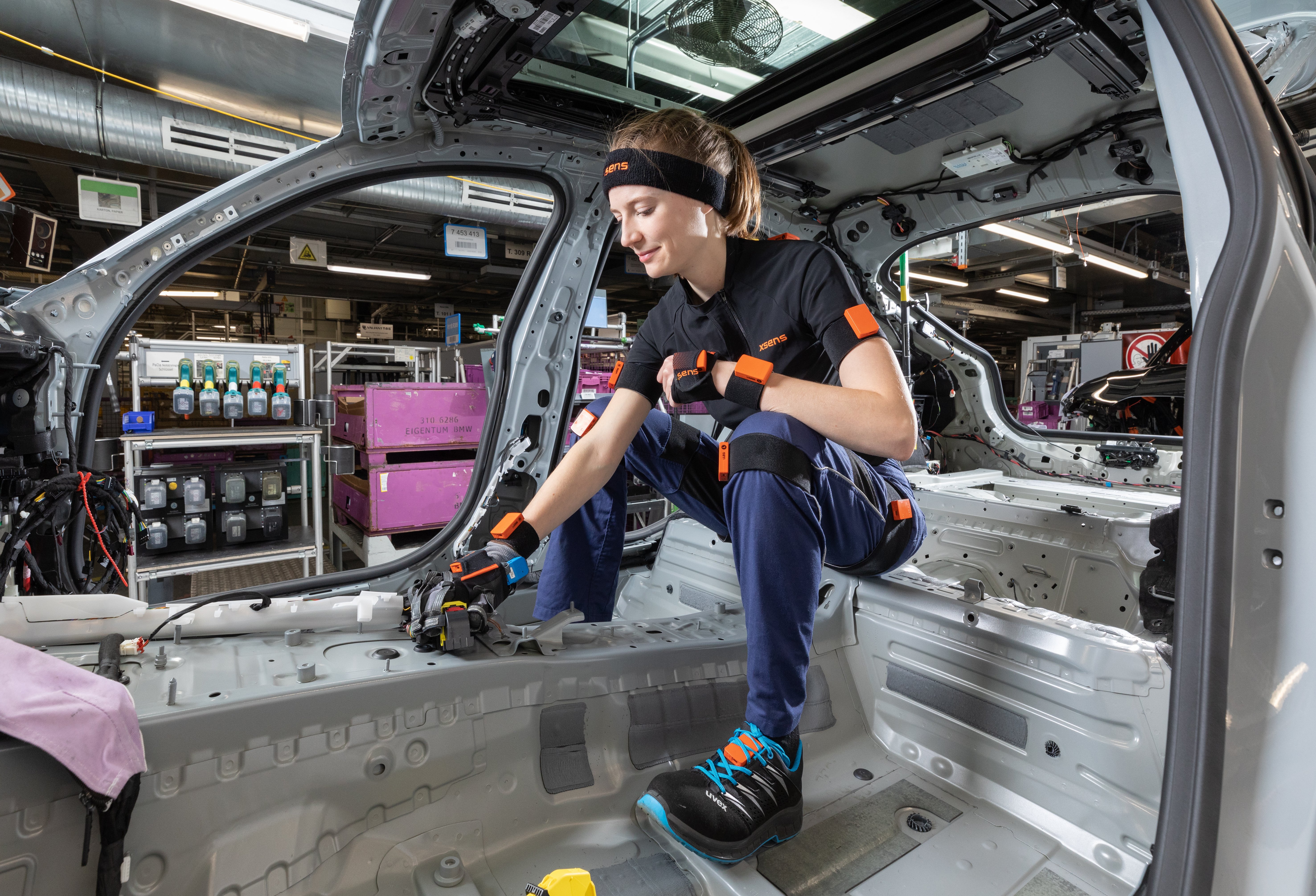 BMW facility worker wearing Xsens Awinda
