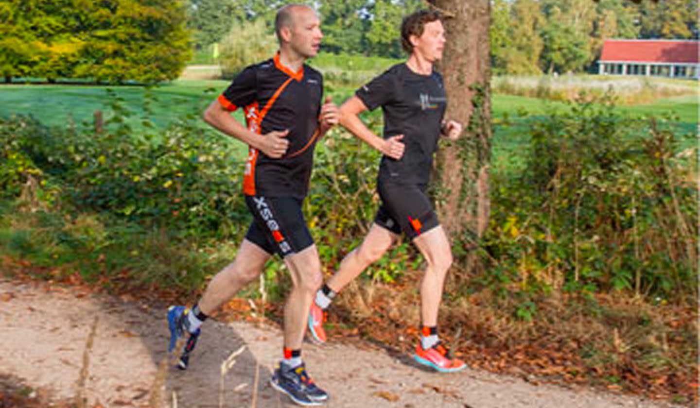 two runners wearing xsens motion capture tshirtss
