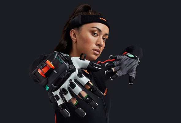 Close up of woman wearing Xsens gloves